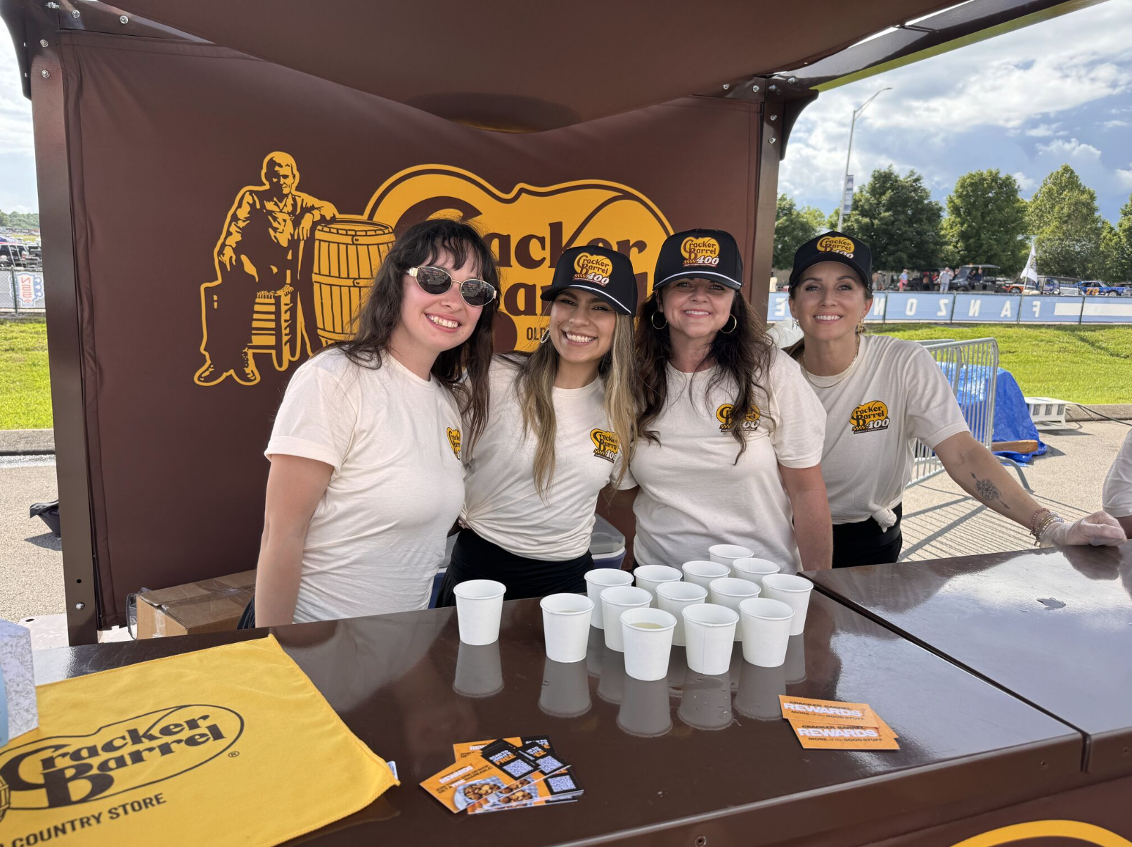 B&G Foods team members smiling together at a Cracker Barrel brand event