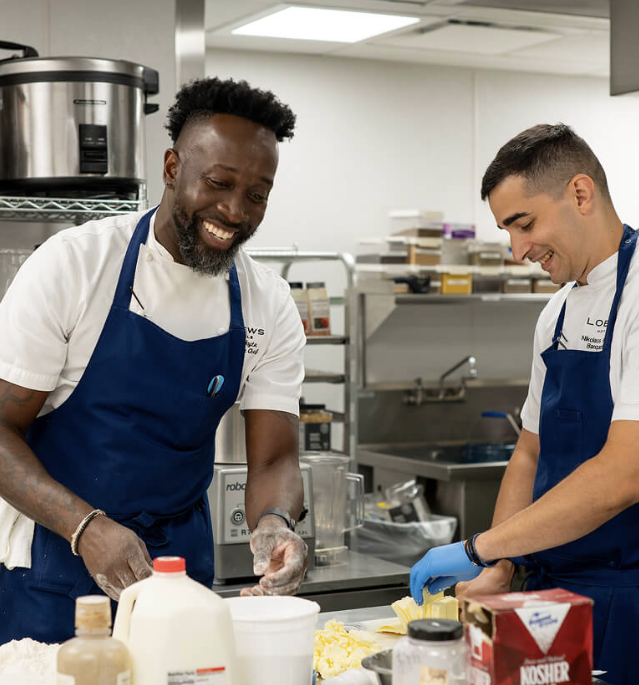 Loews Hotels team members representing the company's welcoming, inclusive culture