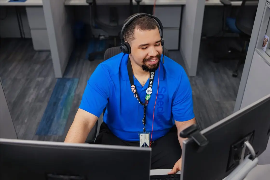 A Spectrum Call Center team member supporting a customer