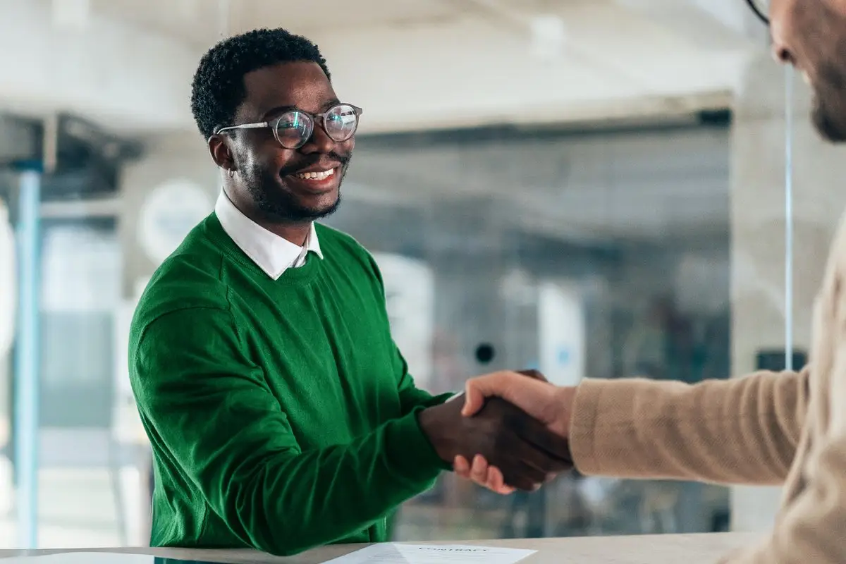 A Spectrum recruiter meeting with a job candidate during an interview
